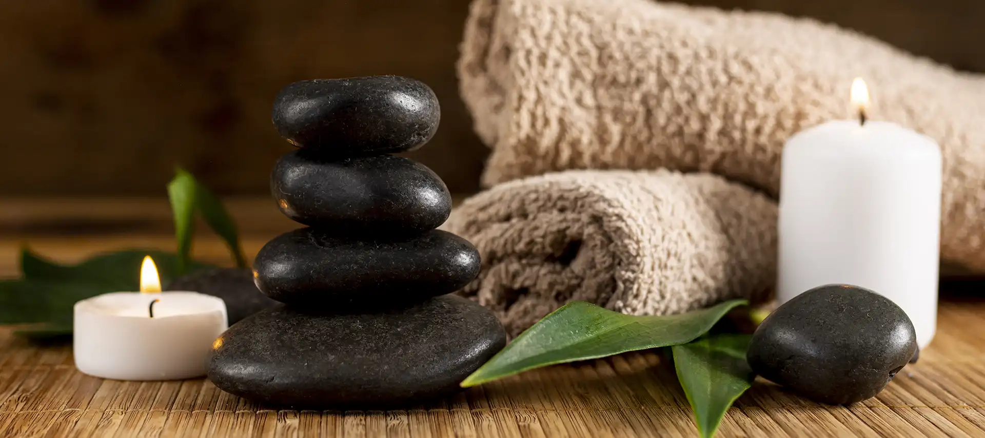 Spa with stones, candles and towels